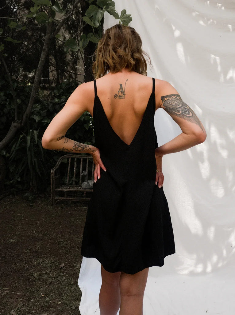Coladas Dress — Black mini dress with low back on model — MYFASHIONFRUIT