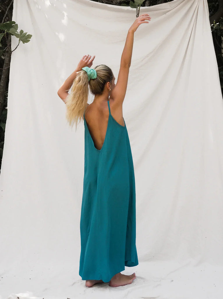 Granadas Dress — Teal maxi dress with a low back on model — MYFASHIONFRUIT