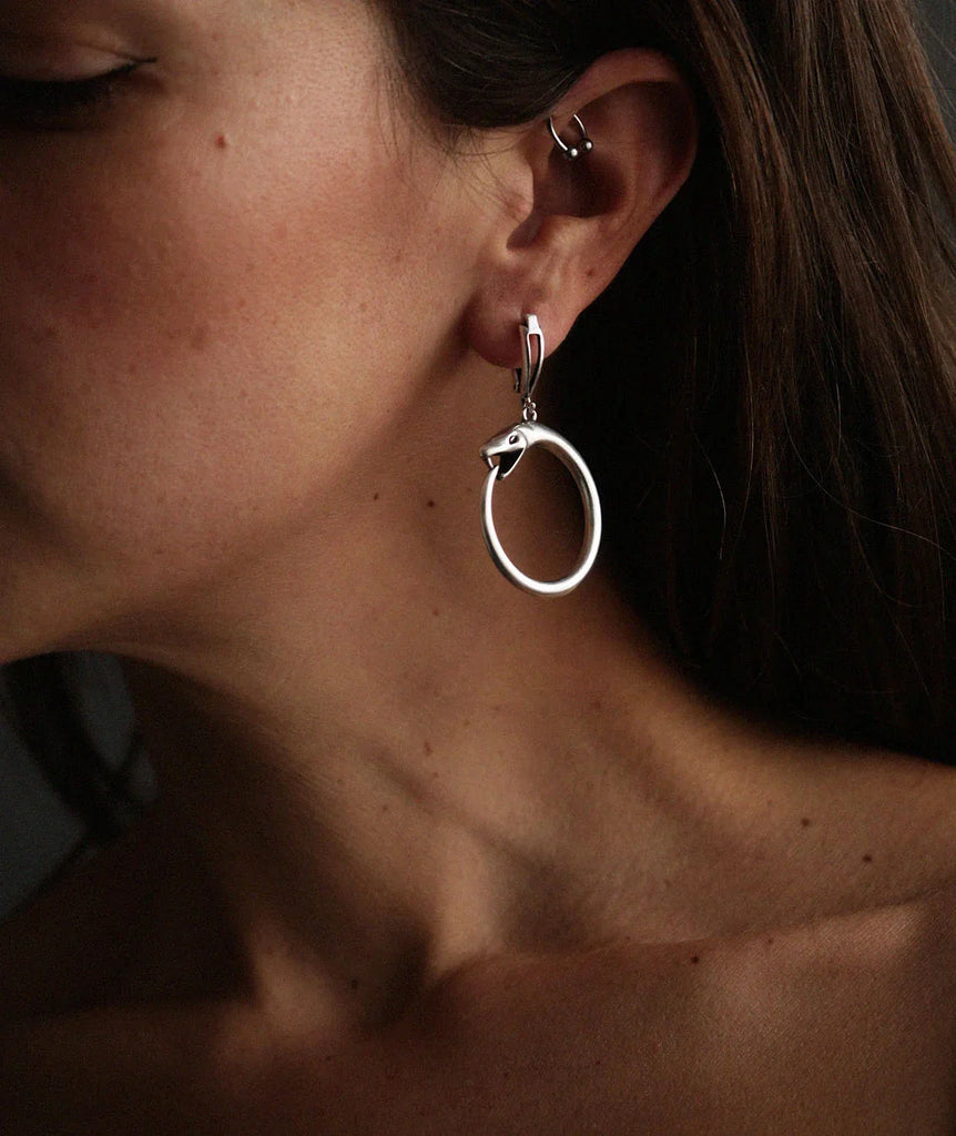 Medusa Hoops — silver tone hoop earrings with snake detail on model — MYFASHIONFRUIT