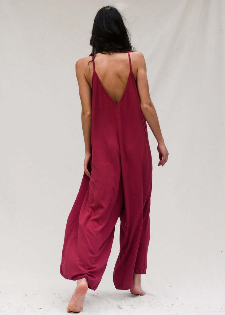 Catalina Cerise Jumpsuit — Cerise jumpsuit with low back on model — MYFASHIONFRUIT